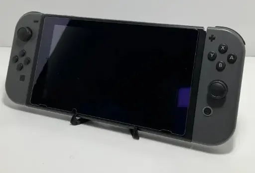 Nintendo Switch w/ OG Joy Cons w/ OG Charger w/ covers XKJ70061622831 USED